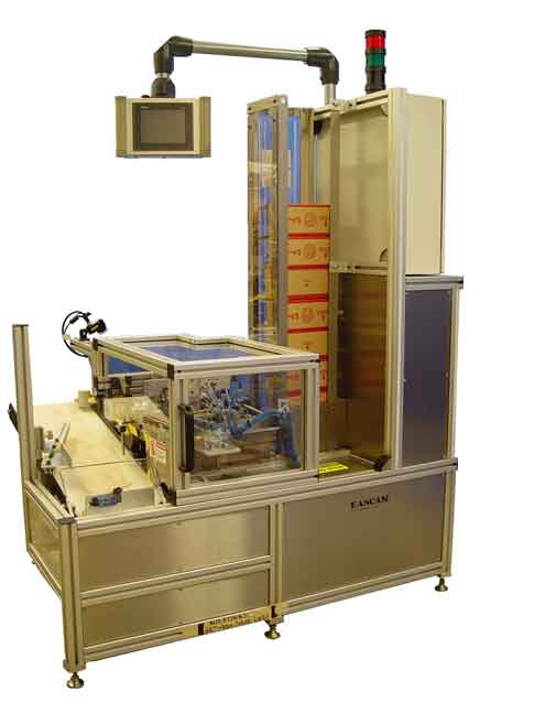 vision machine packaging Vision Roll Downtime, Coin System Improves Reduces